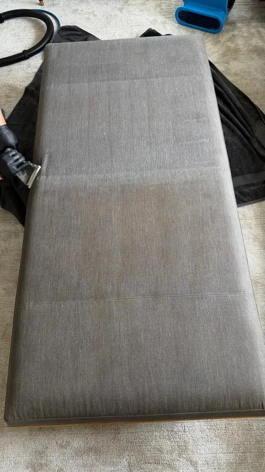 Before and after cleaning of a fabric ottoman by LuHe Carpet Cleaning
