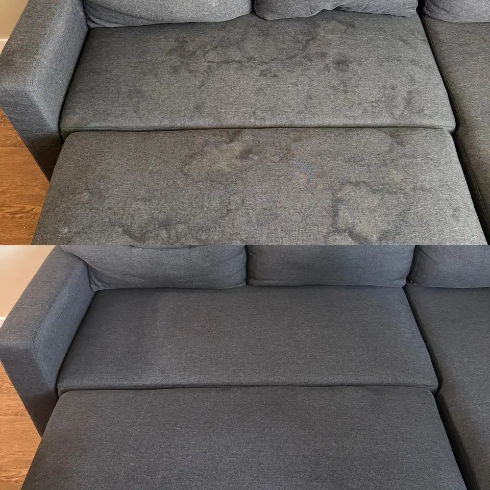 Before and after cleaning of a dark fabric sofa by LuHe Carpet Cleaning